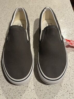 Vans Slip-On Canvas Sneakers in Charcoal and White